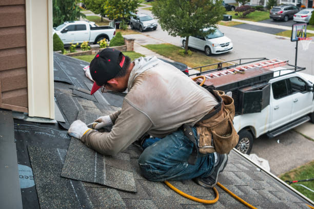 Professional Storm Damage Roof Repair technician working in Hamilton, MT